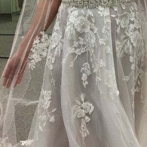 Brand new wedding dress bought last year never used Covid era issues.